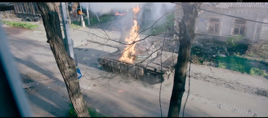Still from the film with Azov attacking Russian tank