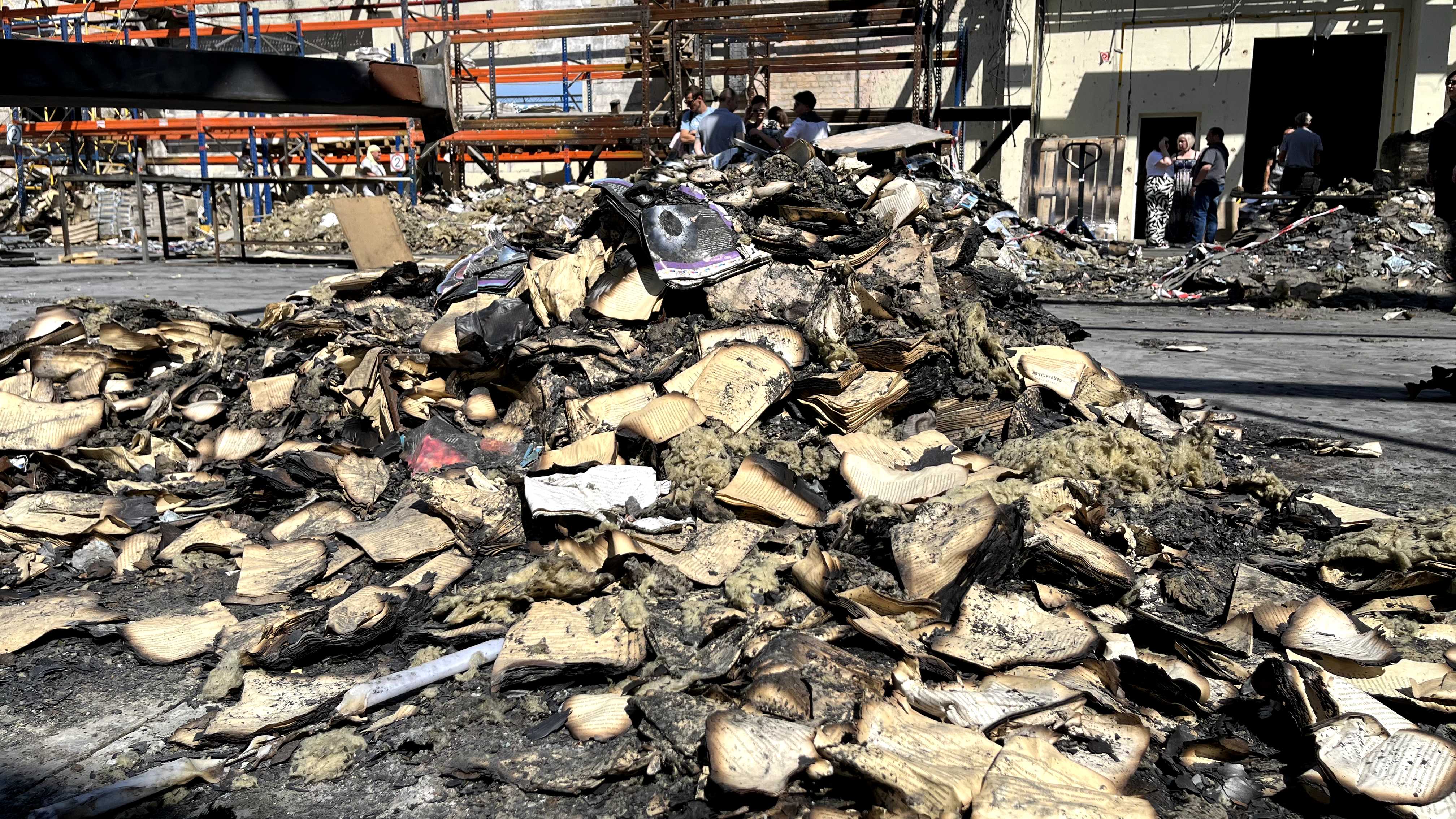 Photos: Nika Krychovska/UkraineWorld. A pile of destroyed books on the binding shop's premises
